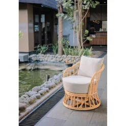 Le Fauteuil PALOPO design scandinave épuré assise en rotin naturel et tissu etanche