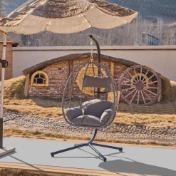 Le fauteuil suspendu VENICE style scandinave en rotin et en métal