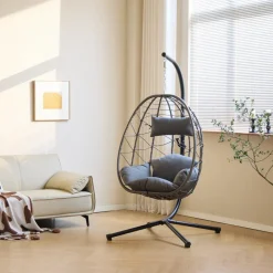 Le fauteuil suspendu VENICE style scandinave en rotin et en métal