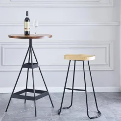 Le tabouret de bar NIKKO avec son design moderne et épuré assise en bois massif