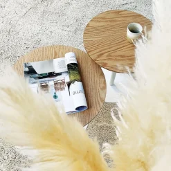 Table basse design ronde 'DILA' en bois finition naturelle et métal blanc