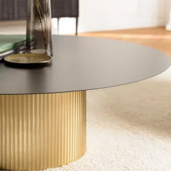 Table basse ronde avec plateau en Fer noir et pied strié Doré JAMES