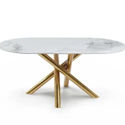 Table ovale Rusking Effet marbre blanc et pieds croisés Métal doré