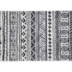 Tapis en fausse fourrure noir et blanc